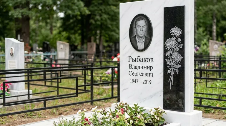 Памятник с гравировкой хризантем — выполненная работа «Рыбаков» в Калининграде