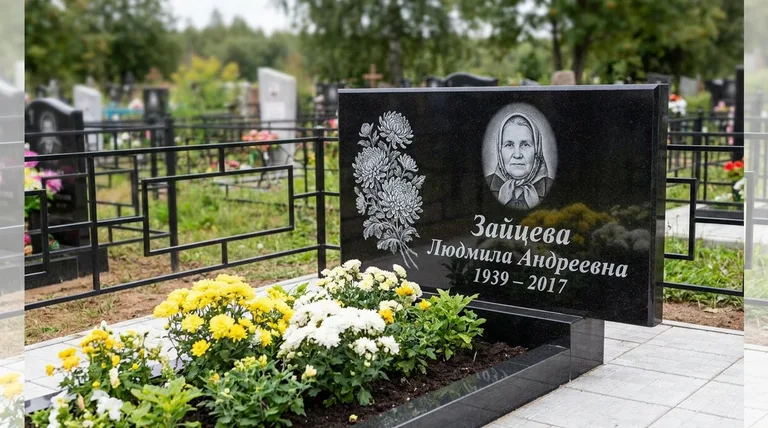 Памятник с гравировкой хризантем — выполненная работа «Зайцева» в Калининграде