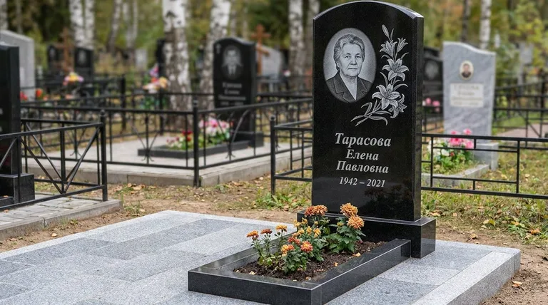 Памятник с гравировкой лилий — выполненная работа «Тарасова» в Калининграде