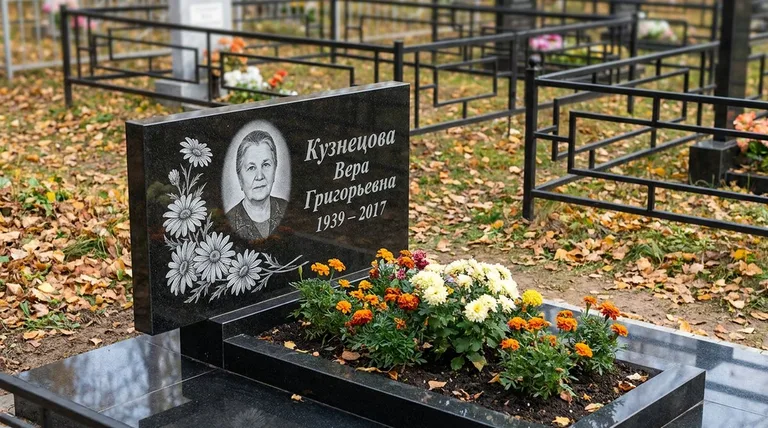 Памятник с гравировкой ромашек — выполненная работа «Кузнецова» в Калининграде