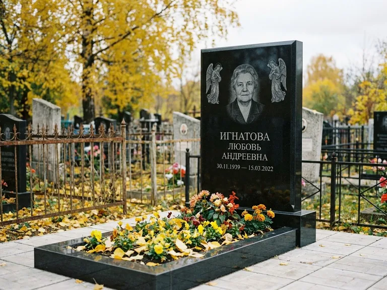 Памятник с гравировкой ангела — гравировка двух ангелов по сторонам портрета, работа «Игнатова» в Калининграде