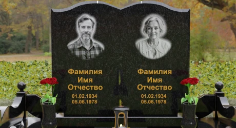 Гранитный памятник в виде раскрытой книги на двоих